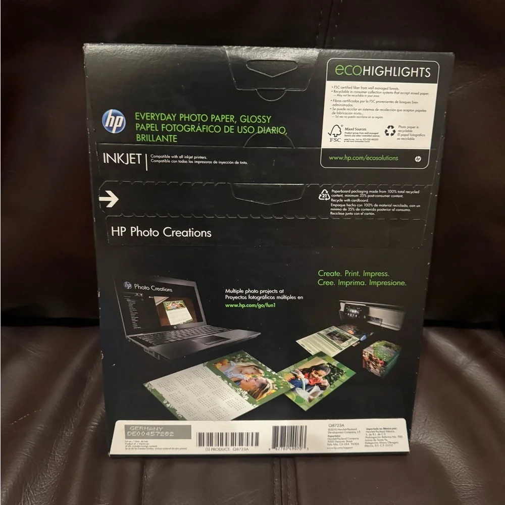 HP Glossy Photo Paper Pack in Black Packaging with Yellow & Red Accents